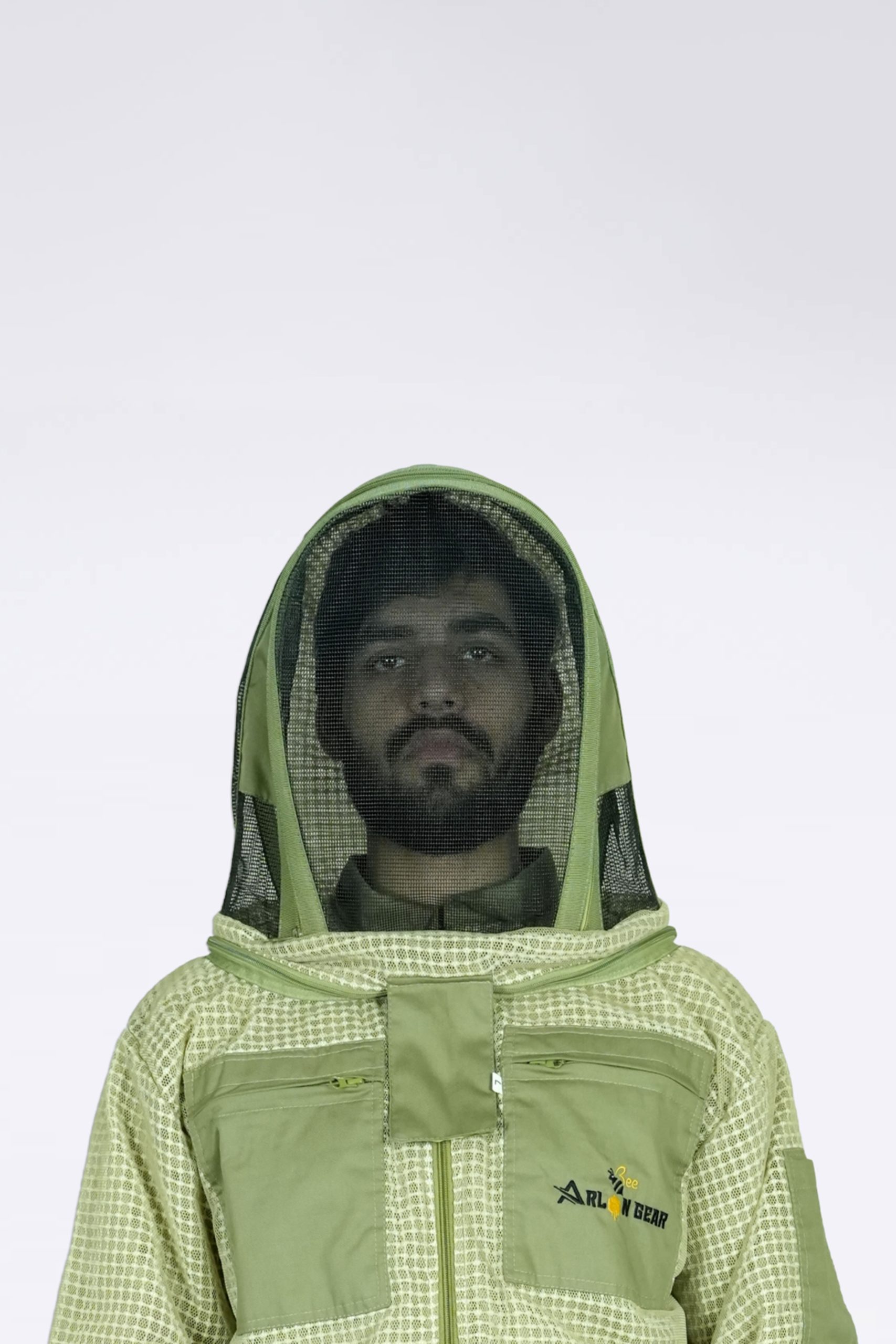Man wearing Arlon Gear ventilated beekeeping jacket with round fencing-style mesh veil, front view showing zippered pockets and logo