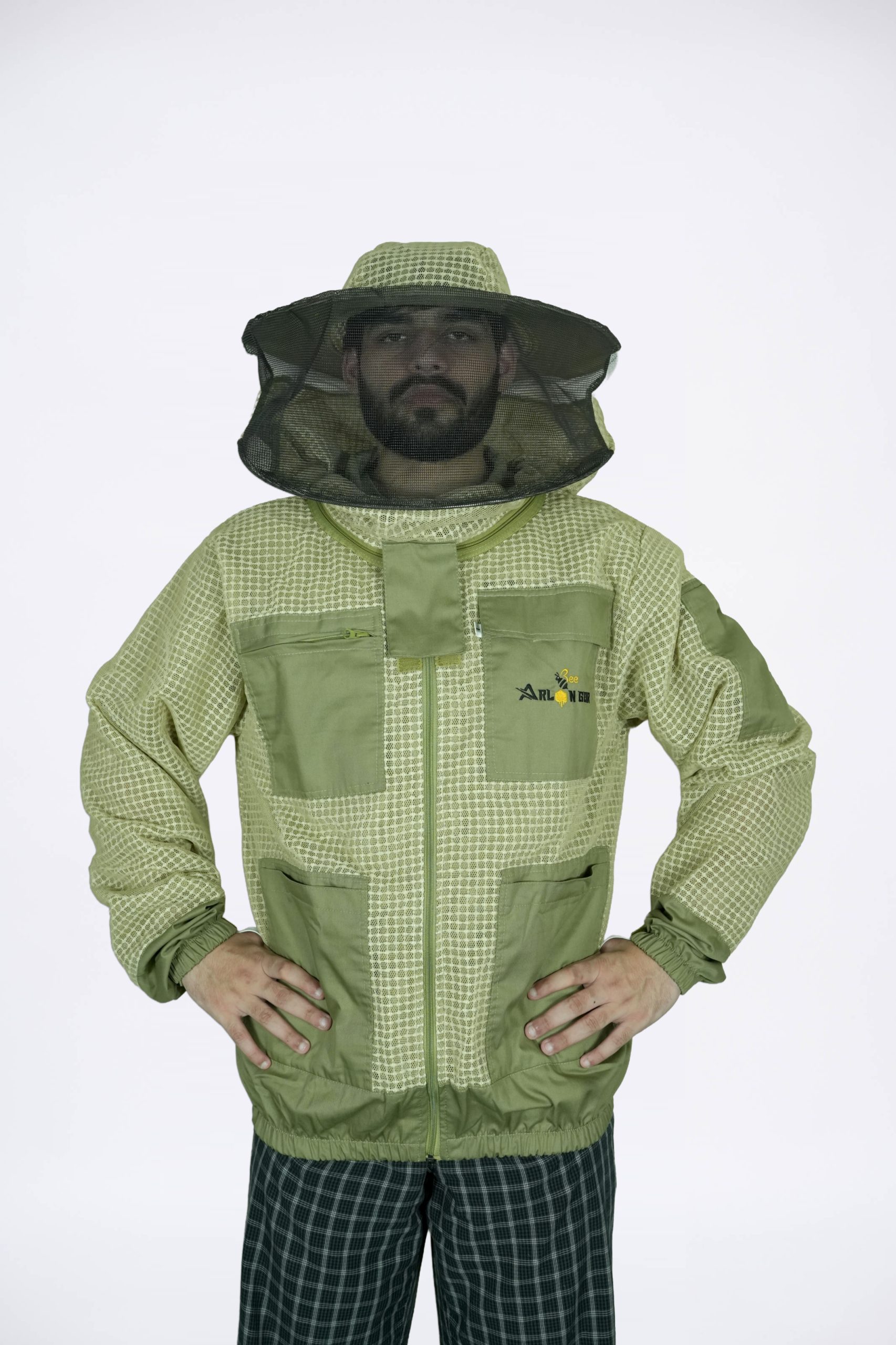 Side profile of olive green mesh beekeeping jacket with fencing veil pulled back off the face